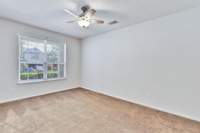 2225 Lou John St, Austin, TX 78727 - empty room with carpet, a ceiling fan, and baseboards