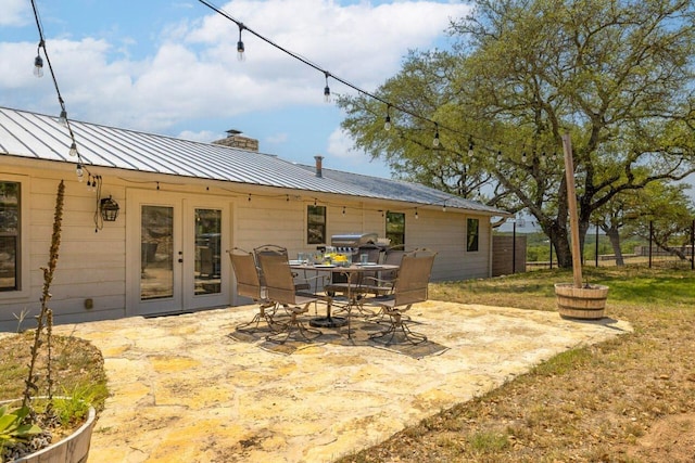 25404 Hamilton Pool Rd, Round Mountain, TX 78663 - view of patio with french doors
