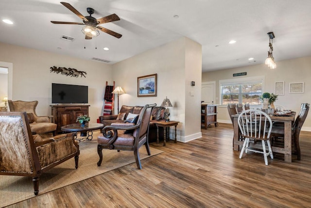 25404 Hamilton Pool Rd, Round Mountain, TX 78663 - living area with ceiling fan, wood finished floors, recessed lighting, and baseboards