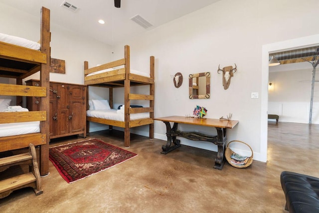 25404 Hamilton Pool Rd, Round Mountain, TX 78663 - bedroom featuring concrete flooring and baseboards