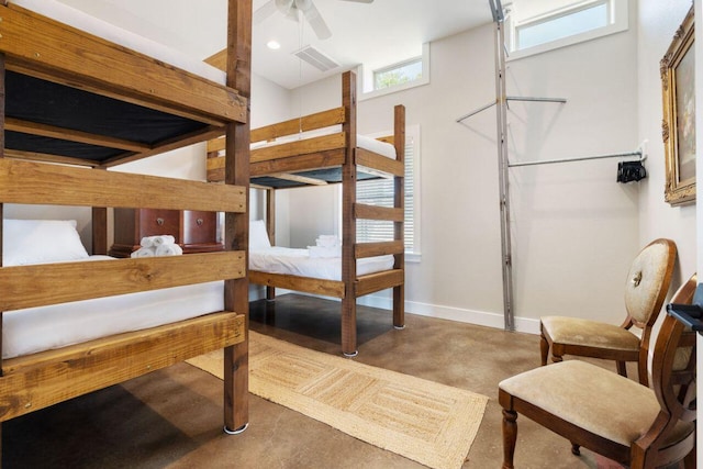 25404 Hamilton Pool Rd, Round Mountain, TX 78663 - bedroom featuring finished concrete flooring and baseboards