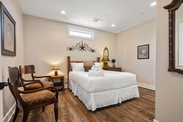 25404 Hamilton Pool Rd, Round Mountain, TX 78663 - bedroom with dark wood-type flooring, baseboards, and recessed lighting