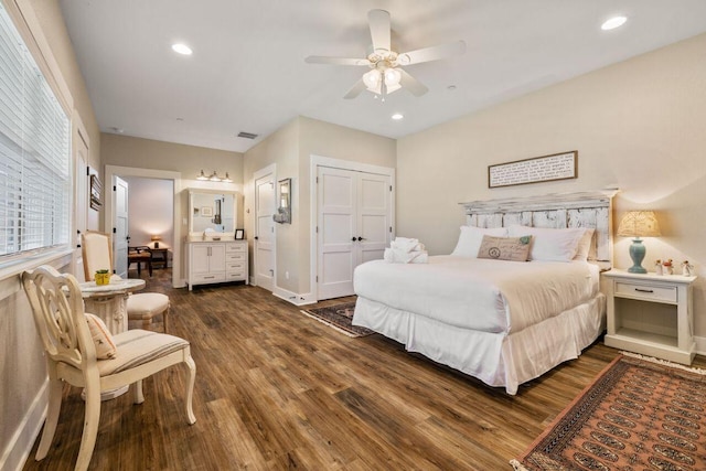 25404 Hamilton Pool Rd, Round Mountain, TX 78663 - bedroom featuring dark wood finished floors, recessed lighting, a ceiling fan, and baseboards