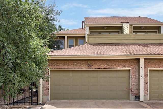 8316 Greenslope Dr Unit A, Austin, TX 78759 - view of front of home featuring brick siding and a shingled roof