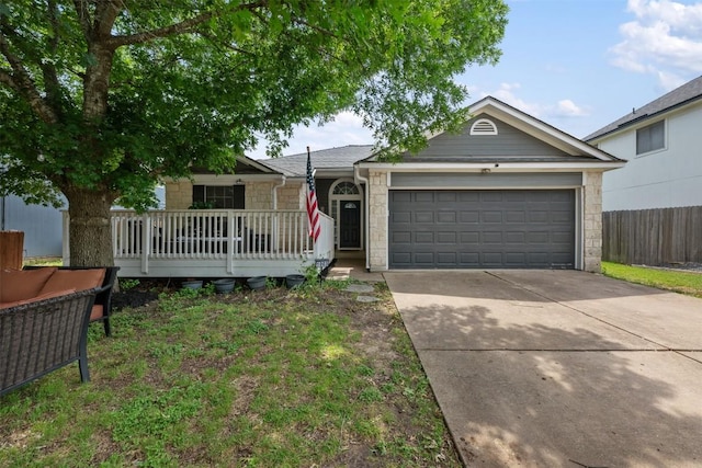 1003 Buttercup Ct, Leander, TX 78641 - single story home featuring a garage, driveway, and stone siding