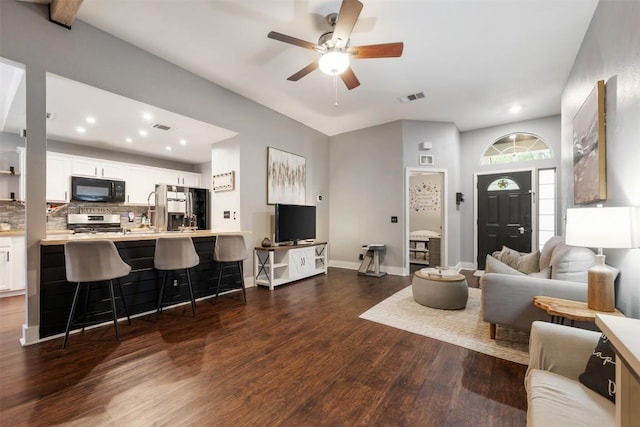 1003 Buttercup Ct, Leander, TX 78641 - living room with dark wood finished floors, a ceiling fan, recessed lighting, and baseboards