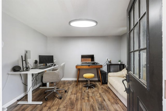 1003 Buttercup Ct, Leander, TX 78641 - office area with wood finished floors and baseboards