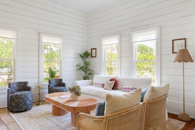 1211 E 13th St, Austin, TX 78702 - living area with wood finished floors and wooden walls