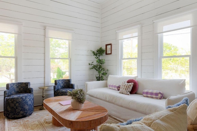 1211 E 13th St, Austin, TX 78702 - living area with wood walls and healthy amount of natural light