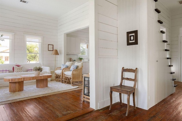 1211 E 13th St, Austin, TX 78702 - corridor with hardwood / wood-style floors, wood walls, and healthy amount of natural light