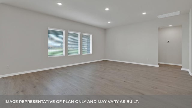 362 Barron Estate Dr, Lockhart, TX 78644 - spare room with wood finished floors, baseboards, and recessed lighting
