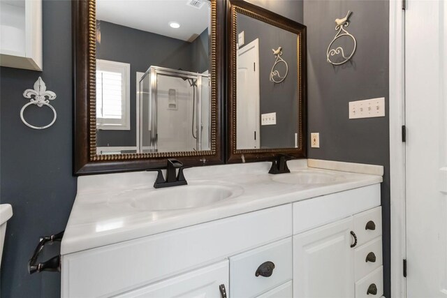 1454 Rose Ln, Canyon Lake, TX 78133 - full bathroom with double vanity and a shower stall