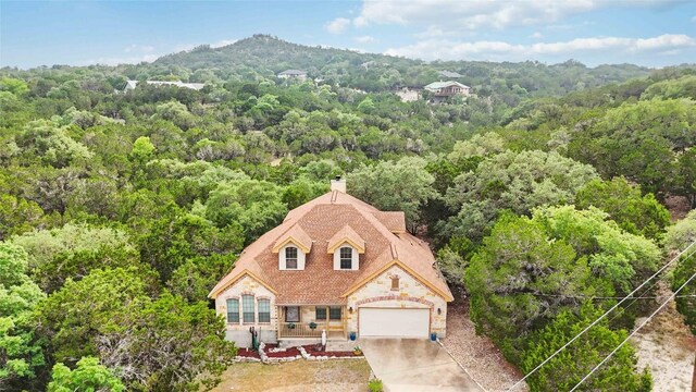 1454 Rose Ln, Canyon Lake, TX 78133 - view from above of property featuring a heavily wooded area