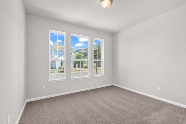 1621 Coral Sunrise Aly, Leander, TX 78641 - carpeted empty room with baseboards