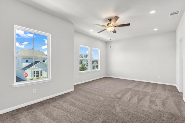 1621 Coral Sunrise Aly, Leander, TX 78641 - empty room featuring carpet flooring, a ceiling fan, baseboards, and recessed lighting
