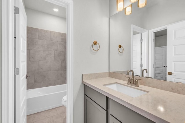 1621 Coral Sunrise Aly, Leander, TX 78641 - full bathroom featuring vanity, toilet, tile patterned floors, bathing tub / shower combination, and a chandelier