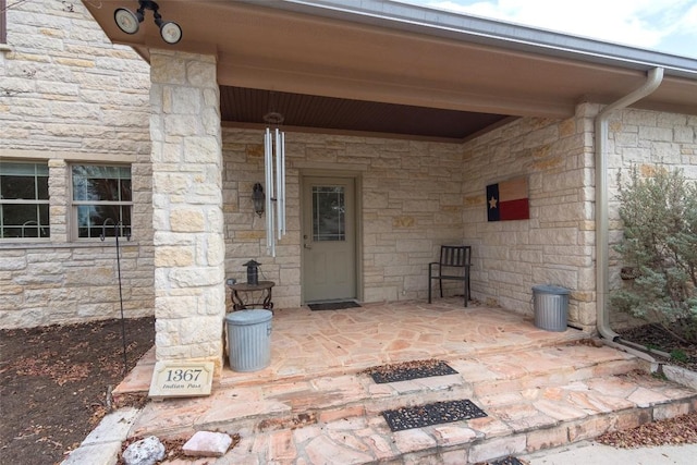 1367 Indian Pass, Salado, TX 76571 - property entrance featuring stone siding and a patio