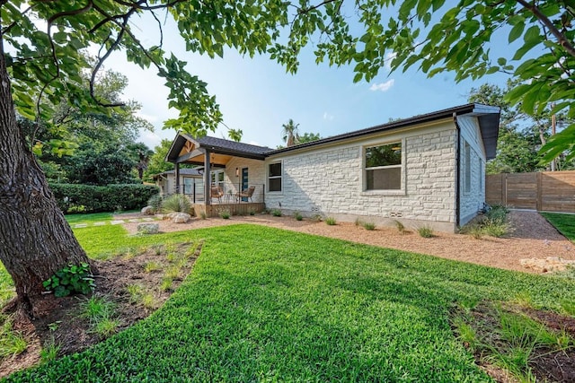 1314 Ridgemont Dr, Austin, TX 78723 - view of front of house featuring stone siding and covered porch