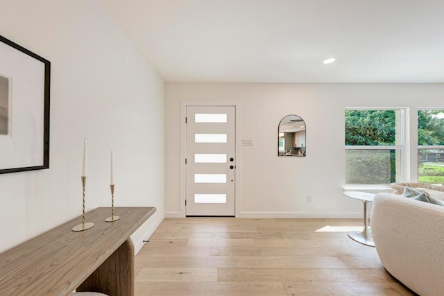 1314 Ridgemont Dr, Austin, TX 78723 - foyer entrance with light wood finished floors, baseboards, and recessed lighting