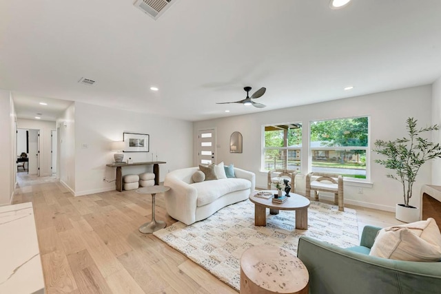1314 Ridgemont Dr, Austin, TX 78723 - living room with recessed lighting, light wood finished floors, and ceiling fan