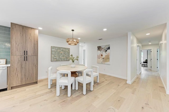 1314 Ridgemont Dr, Austin, TX 78723 - dining area with light wood-style flooring, recessed lighting, a chandelier, and baseboards