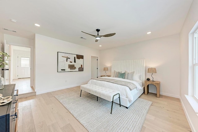 1314 Ridgemont Dr, Austin, TX 78723 - bedroom with light wood-style floors, baseboards, a ceiling fan, and recessed lighting