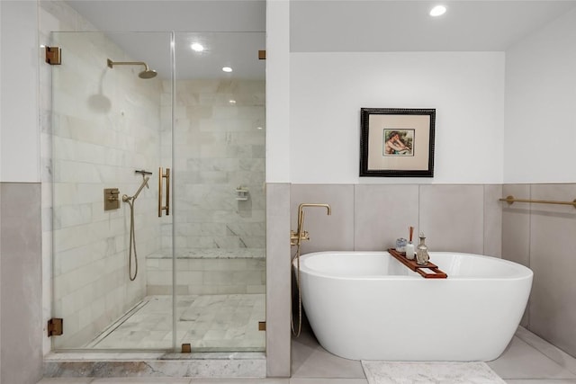 70 Rainey St Unit 2106, Austin, TX 78701 - bathroom with a freestanding bath, a stall shower, and recessed lighting