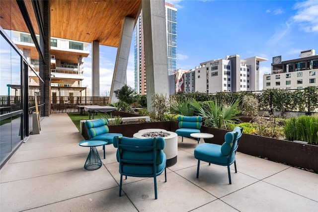 70 Rainey St Unit 2106, Austin, TX 78701 - view of patio with a fire pit