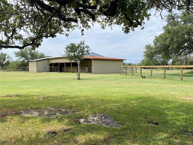 140 Oakridge Rd, Georgetown, TX 78628 - view of yard featuring an outbuilding and an outdoor structure