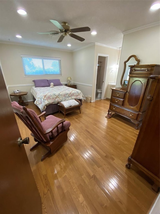140 Oakridge Rd, Georgetown, TX 78628 - bedroom featuring ornamental molding, wood finished floors, recessed lighting, ceiling fan, and ensuite bath