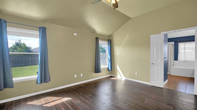 18409 Hees Ln, Pflugerville, TX 78660 - unfurnished room featuring wood finish floors, lofted ceiling, a ceiling fan, and baseboards