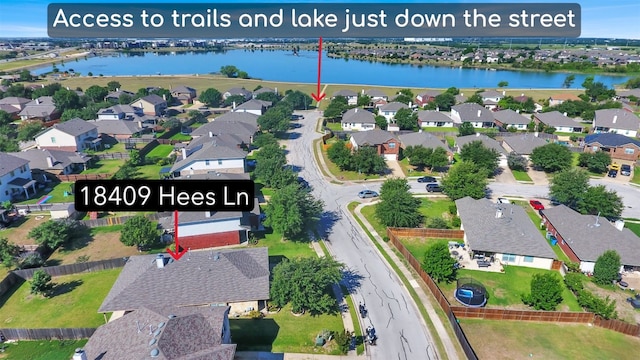 18409 Hees Ln, Pflugerville, TX 78660 - aerial view of residential area featuring a nearby body of water