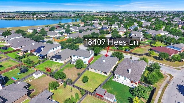 18409 Hees Ln, Pflugerville, TX 78660 - aerial view of property's location featuring a large body of water and nearby suburban area