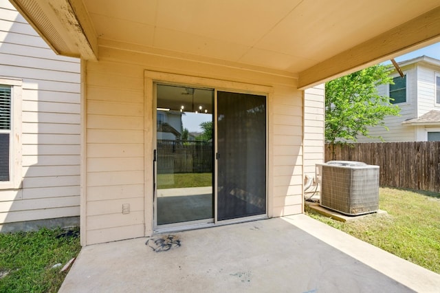 179 Pimlico, Kyle, TX 78640 - doorway to property featuring a patio and central AC unit