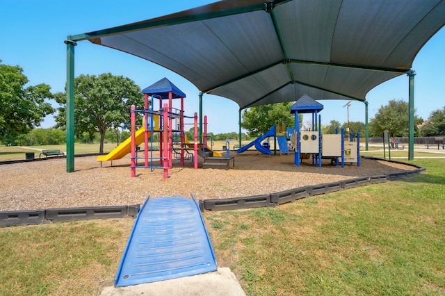 179 Pimlico, Kyle, TX 78640 - community jungle gym featuring a lawn