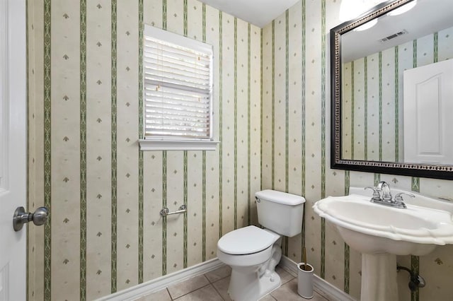 2511 Jacqueline Dr, Leander, TX 78641 - half bath featuring toilet, tile patterned flooring, and wallpapered walls