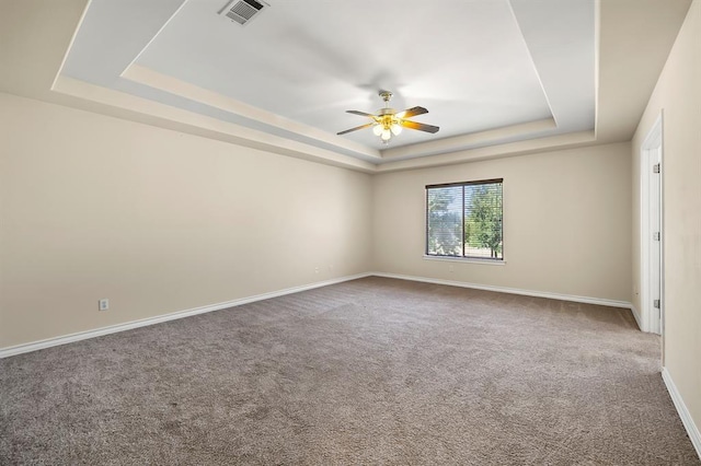 2511 Jacqueline Dr, Leander, TX 78641 - carpeted empty room with a raised ceiling, a ceiling fan, and baseboards