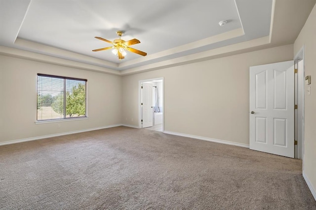 2511 Jacqueline Dr, Leander, TX 78641 - unfurnished room with a raised ceiling, ceiling fan, baseboards, and carpet flooring