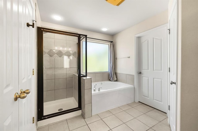 2511 Jacqueline Dr, Leander, TX 78641 - full bathroom featuring a garden tub, tile patterned flooring, and a shower stall