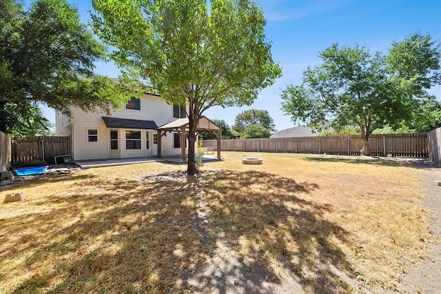 2511 Jacqueline Dr, Leander, TX 78641 - view of yard with an outdoor fire pit, a gazebo, and a patio area