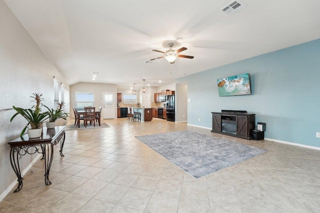 432 Druse Ln, Jarrell, TX 76537 - living area with a ceiling fan, light tile patterned flooring, and baseboards
