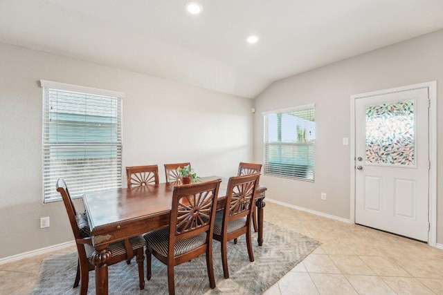 432 Druse Ln, Jarrell, TX 76537 - dining room with light tile patterned floors, lofted ceiling, recessed lighting, and baseboards