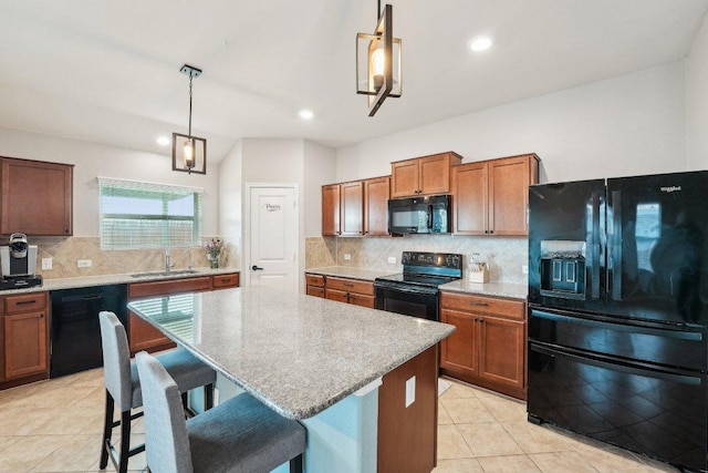 432 Druse Ln, Jarrell, TX 76537 - kitchen featuring black appliances, a sink, light tile patterned flooring, decorative backsplash, and recessed lighting