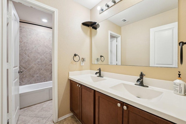 432 Druse Ln, Jarrell, TX 76537 - full bath with double vanity, tile patterned floors, and bathtub / shower combination