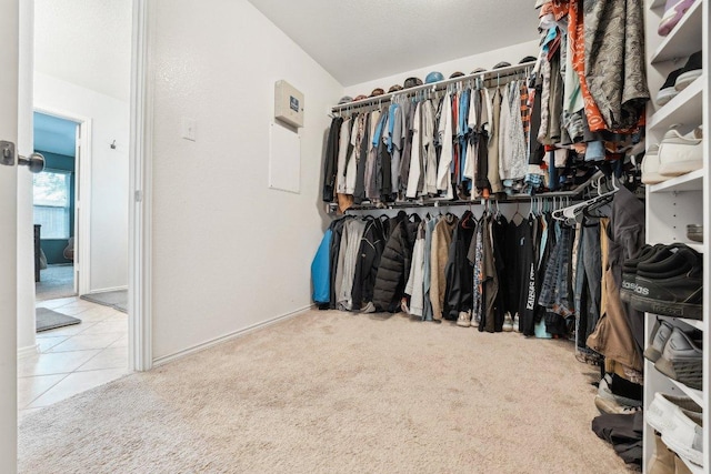 432 Druse Ln, Jarrell, TX 76537 - spacious closet featuring carpet flooring and tile patterned flooring