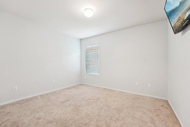 432 Druse Ln, Jarrell, TX 76537 - unfurnished room featuring light carpet and baseboards