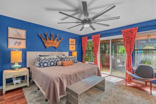 259 Akaloa Dr, Bastrop, TX 78602 - bedroom featuring access to exterior, wood finished floors, and ceiling fan