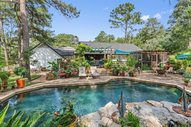 259 Akaloa Dr, Bastrop, TX 78602 - swimming pool with a patio