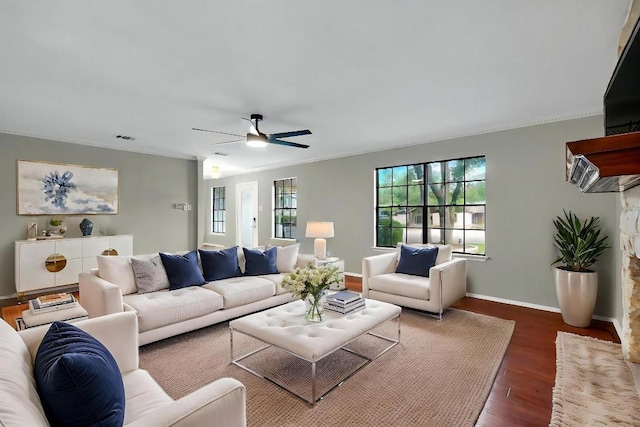2617 Chowan Cv, Round Rock, TX 78681 - living room with wood finished floors, ceiling fan, and ornamental molding
