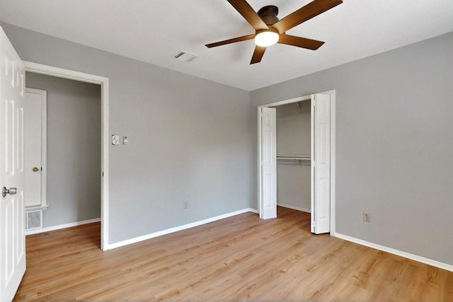2617 Chowan Cv, Round Rock, TX 78681 - unfurnished bedroom with light wood-style flooring, a closet, and a ceiling fan